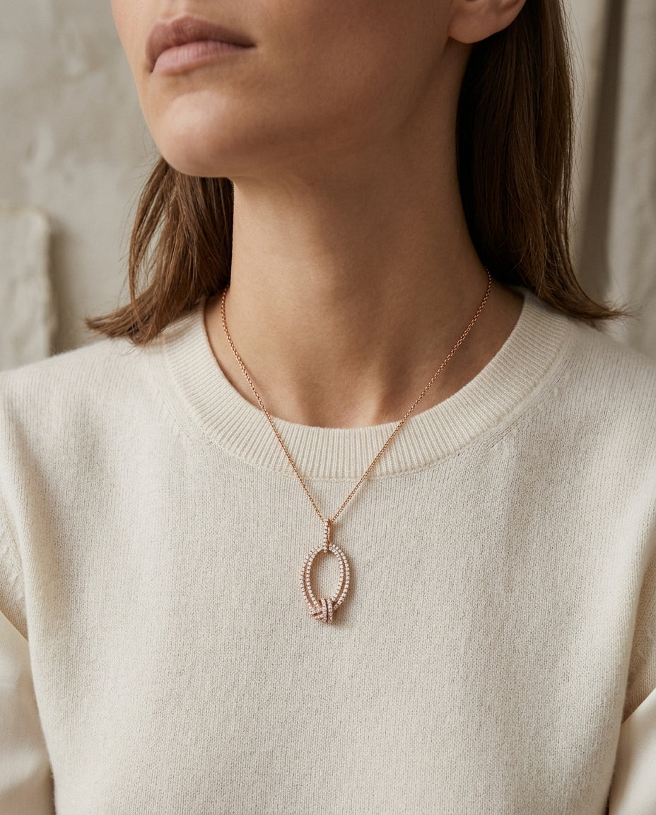 Pave Diamond Knot Pendant In 14k Rose Gold — editorial close-up
