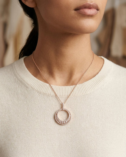 Graduated Circle Three Rolls Diamond Pendant In 14k Rose Gold — editorial close-up