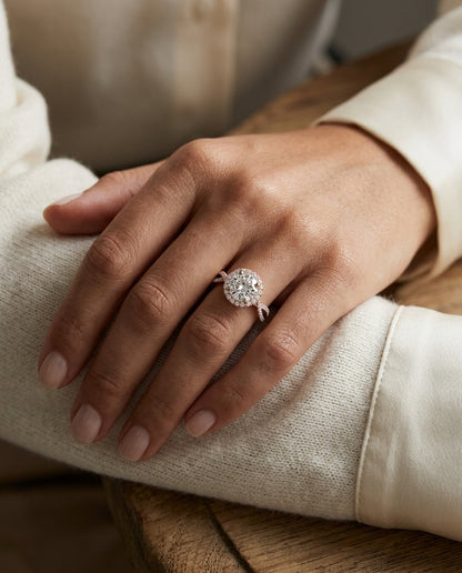 1 1/2ctw Round Diamond Halo Engagement Ring With Infinity Shank In 14k Rose Gold, Igi-certified — editorial close-up