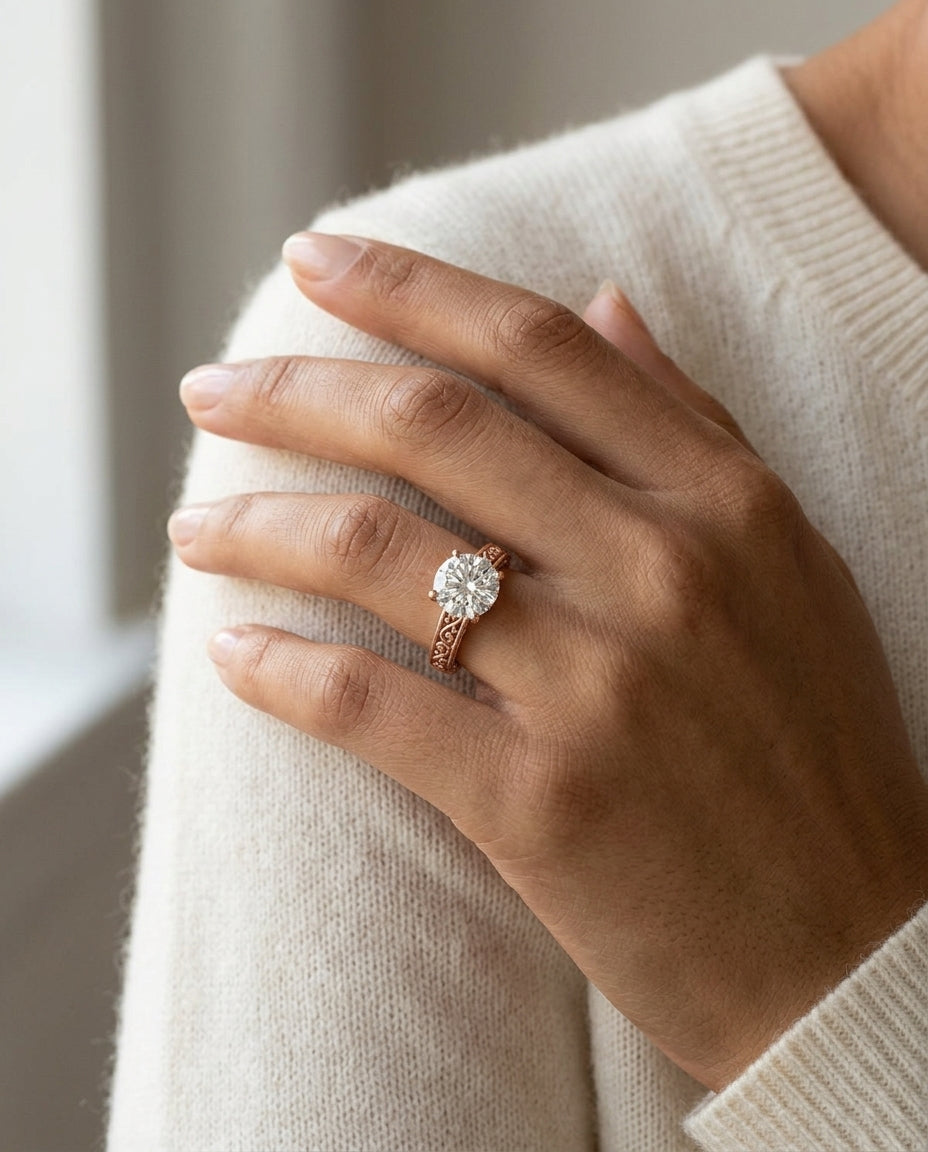 1ct Round Diamond Solitaire Engagement Ring With Scroll Detail Shank In 14k Rose Gold, Igi-certified — editorial close-up