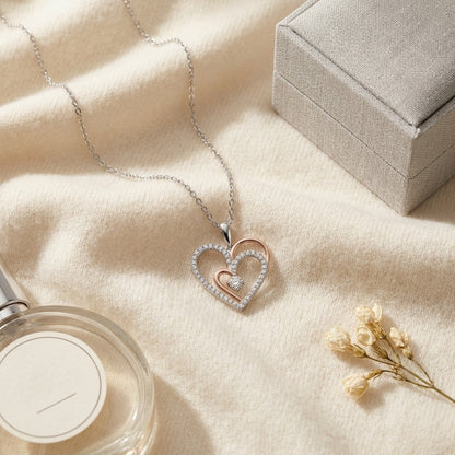 Diamond Two Tone Heart Pendant In 14k White/Rose Gold — textile flat lay