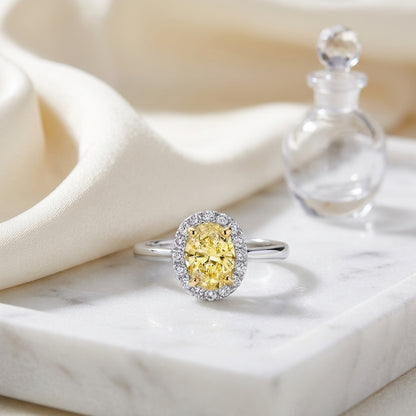 Fancy Light Yellow Diamond Oval Halo Ring In 14k Two Tone Gold — atelier still life