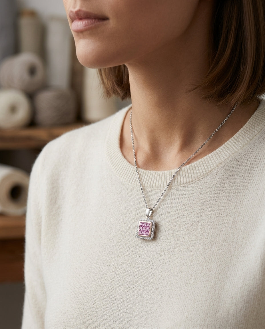 Pink Sapphire And Diamond Pendant In 14k Two Tone Gold (1/6 Ct. Tw.) — editorial close-up