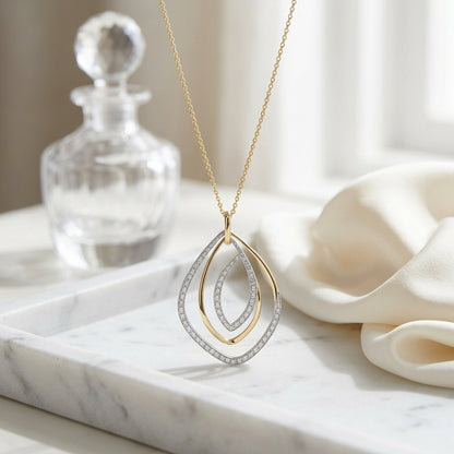 Diamond Overlapping Multi-Loop Two Tone Pendant in 14K Gold 1/3ctw, 16-18 Inch Adjustable Cable Chain in 14K Two Tone Gold | Carl K. Gumpert