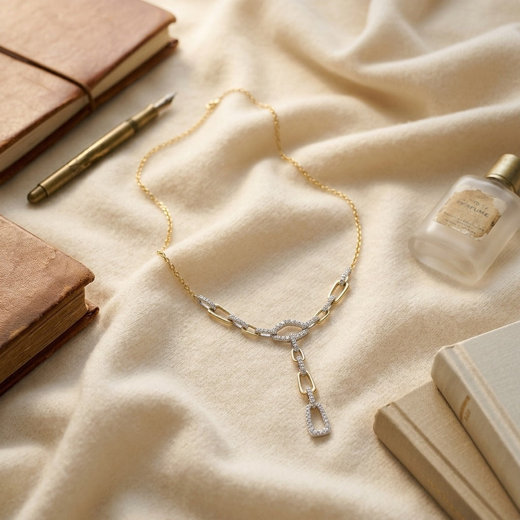 Diamond Graduated Links with Pave and High Polish Finish Y Necklace in 14k White and Yellow Gold — textile flat lay