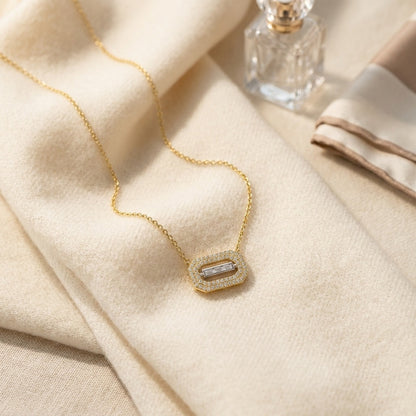 Baguette and Round Diamond East West Paper Clip Necklace in 14k Two Tone Gold 1/3ctw — textile flat lay