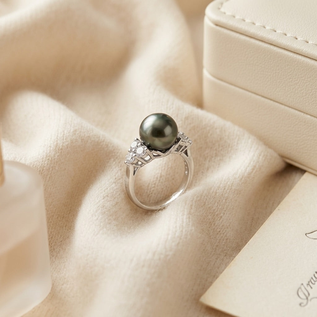 Black South Sea Pearl And Diamond Ring In 14k White Gold — textile flat lay