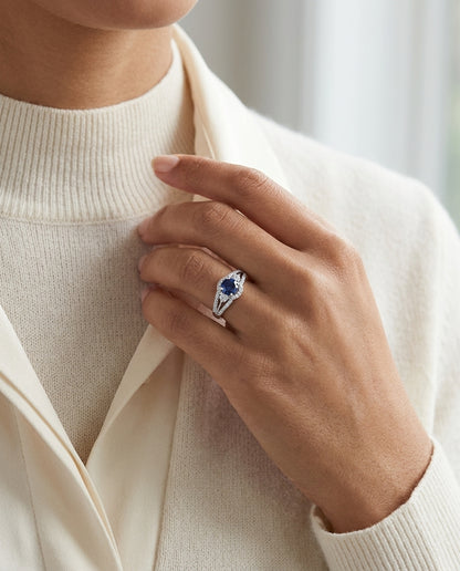 Round Blue Sapphire And Diamond Split Shank Halo Ring In 14k White Gold (hi/vs) (6mm) — editorial close-up