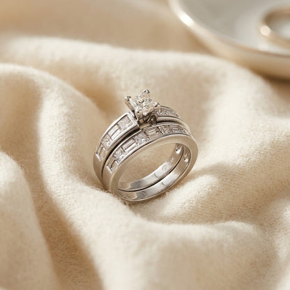 Diamond Princess and Baguette Alternating Channel Wedding Set in 14k White Gold — textile flat lay