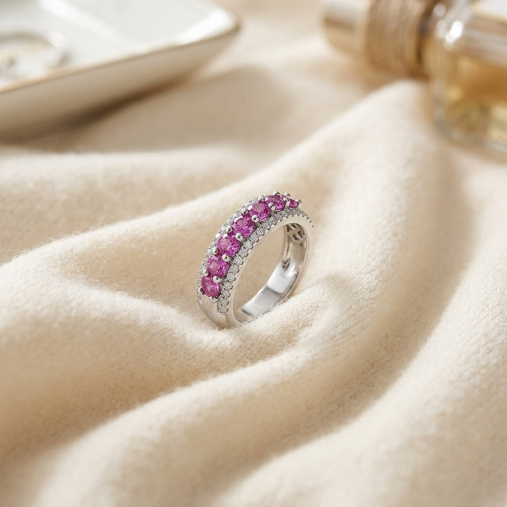 Rhodolite Garnet and Diamond Band in 14k White Gold — textile flat lay