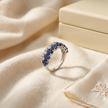 Sapphire And Diamond Layered Scallop Edge Band In 14k White Gold 3/8ctw — textile flat lay