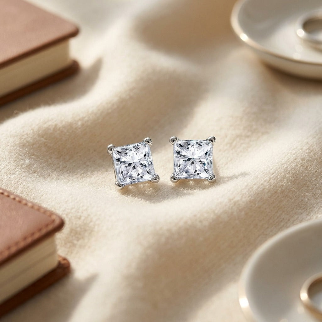Diamond 4-prong Princess Studs 14k White Gold — textile flat lay