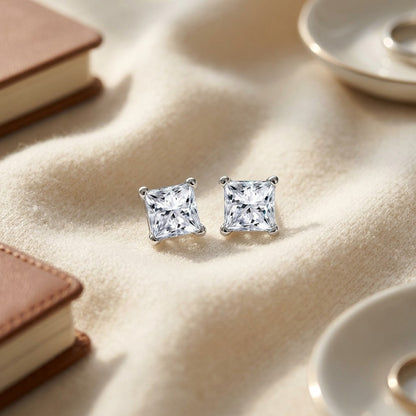 Diamond 4-prong Princess Studs 14k White Gold — textile flat lay