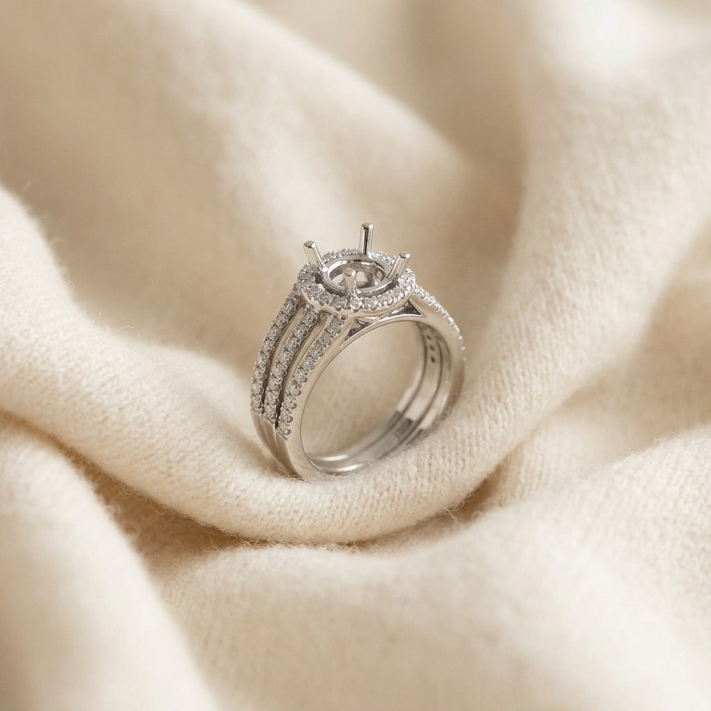 Diamond Pave Halo Triple Split Shank Wedding Set in 14k White Gold — textile flat lay