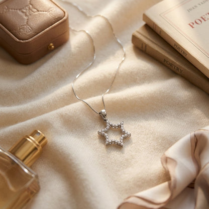 Diamond Star Of David Pendant In 14k White Gold — textile flat lay