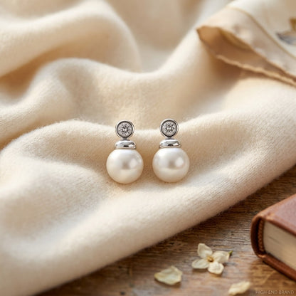 Pearl and Diamond Button Drop Earrings in 14k White Gold — textile flat lay