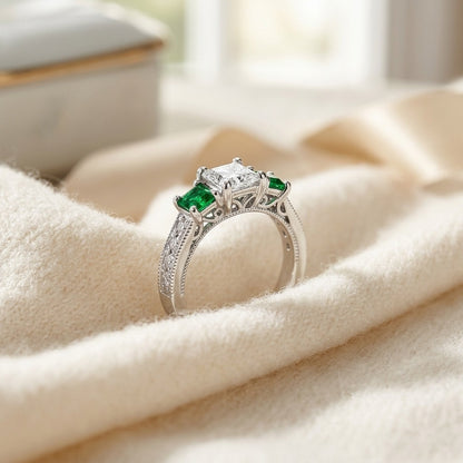Estie G 14k White Gold 1/8ct Tdw Diamond and Tsavorite 3-Stone Ring (H-I, I1-I2) (Size 7) — textile flat lay