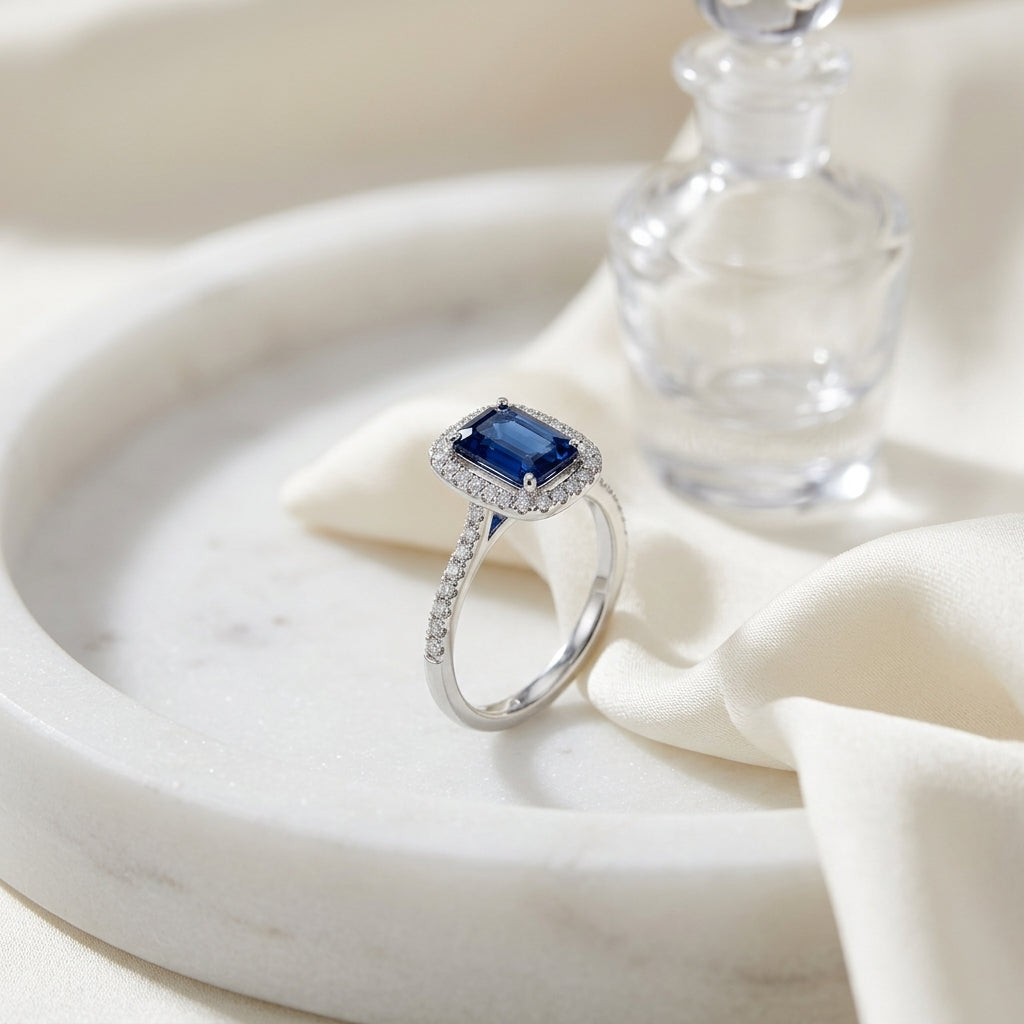 Emerald Cut Sapphire And Micropave Diamond Halo Ring In 14k White Gold — atelier still life
