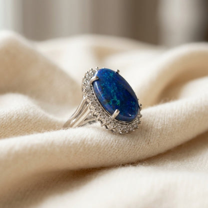 Black Opal / Blue and Diamond Bold Split Shank Ring in 14k White Gold (18x13mm Oval Center) — textile flat lay