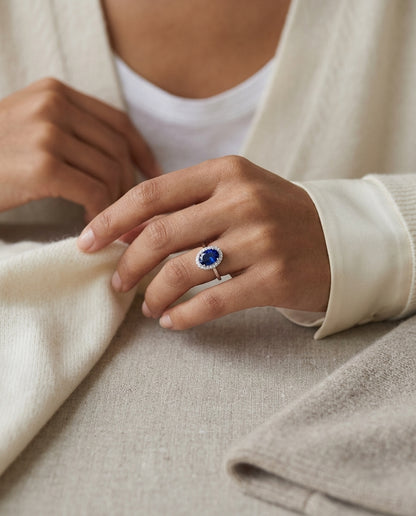 Sapphire And Diamond Halo Ring In 14k White Gold — editorial close-up