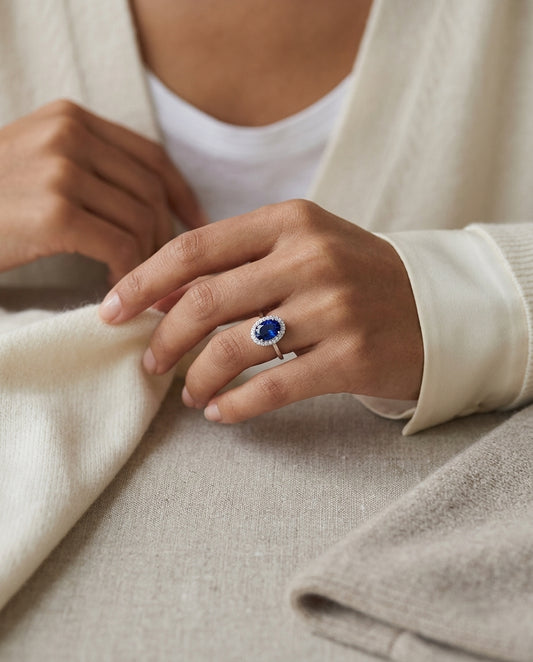 Sapphire And Diamond Halo Ring In 14k White Gold — editorial close-up