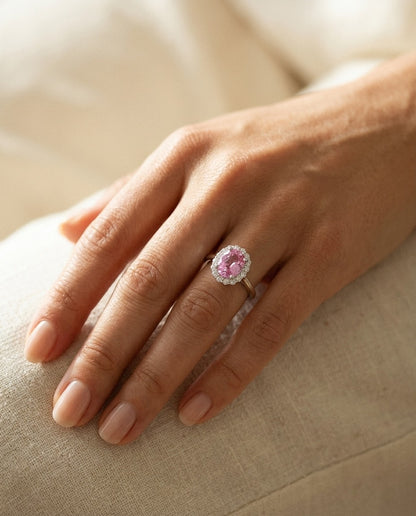 Oval Pink Sapphire And Diamond Halo Ring In 14k White Gold — portrait close