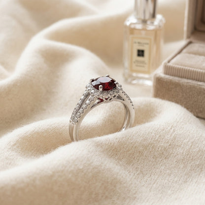 Ruby and Diamond Split Shank Flower Ring in 14k White Gold — textile flat lay
