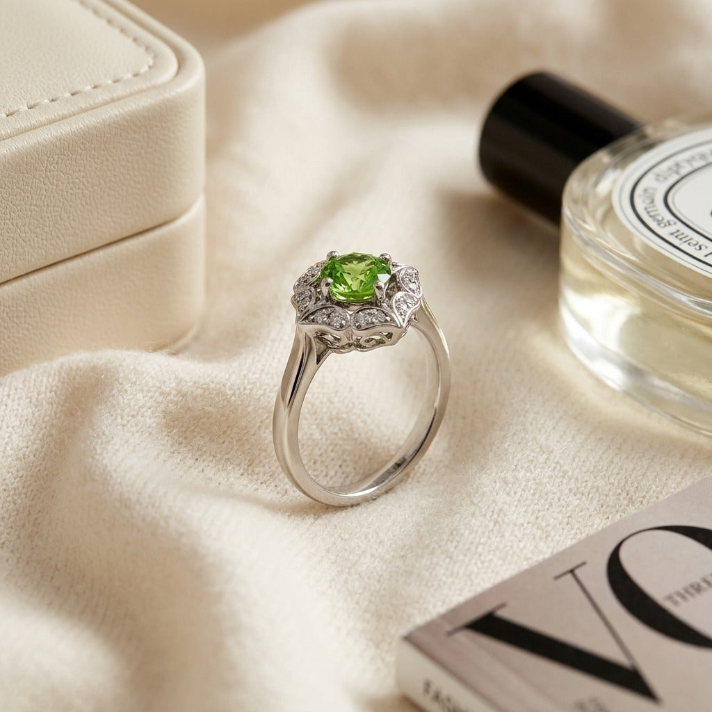 Peridot and Diamond Flower Ring in 14k White Gold — textile flat lay