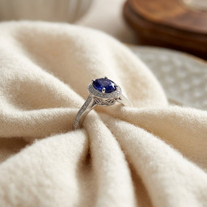 Iolite And Diamond Oval Halo Ring In 14k White Gold — textile flat lay