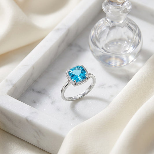 Blue Topaz Cushion Cut And Diamond Halo Ring  In 14k White Gold — atelier still life