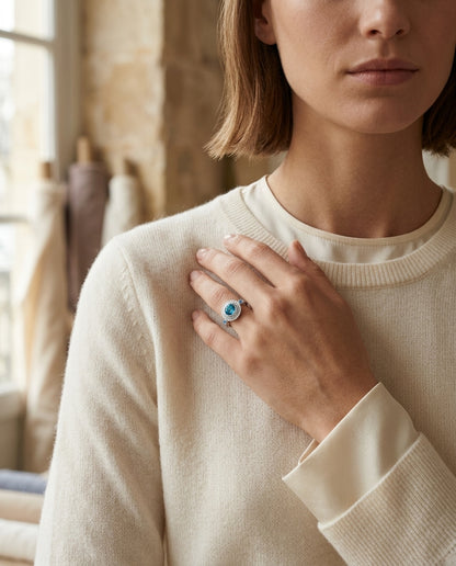 Blue Topaz And Diamond Circle Bezel Ring In 14k White Gold — editorial close-up
