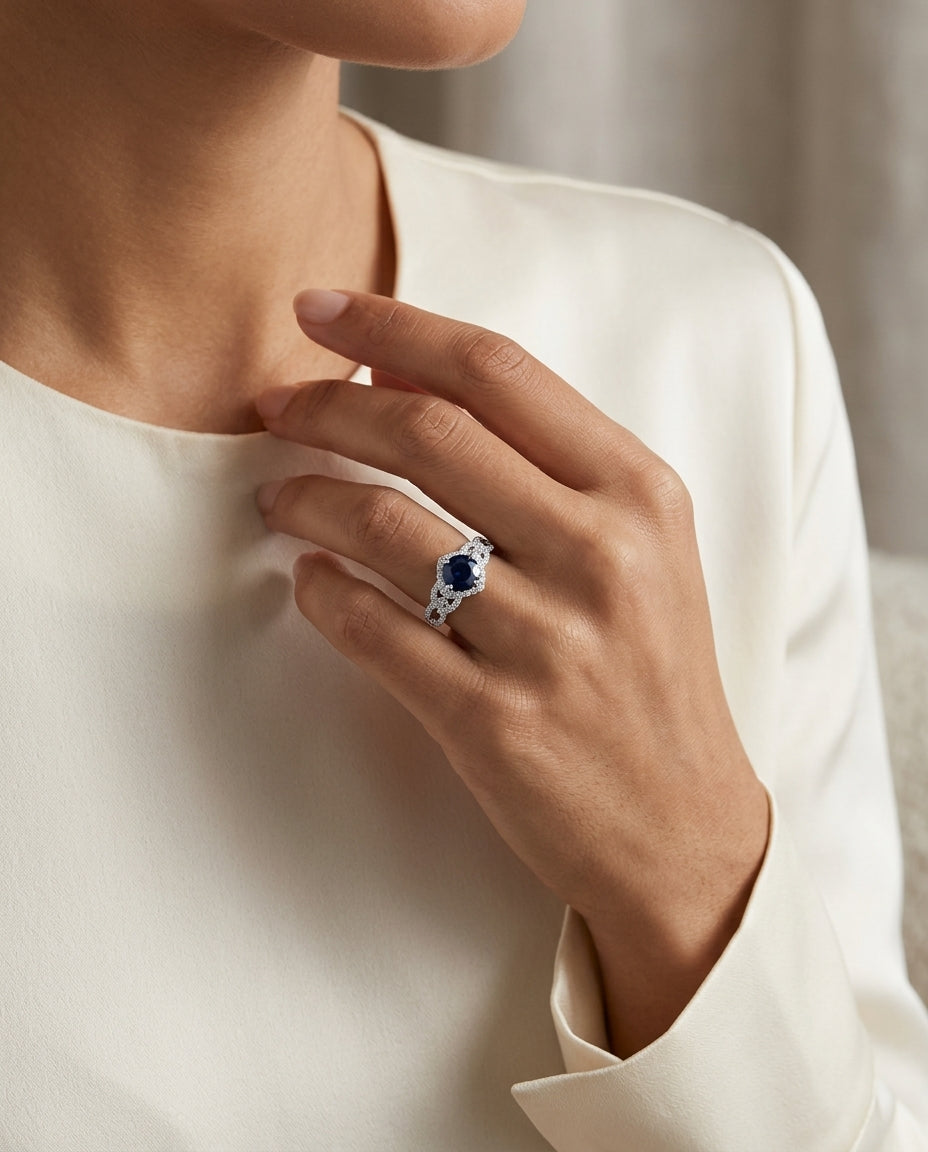 Round Blue Sapphire And Diamond Twisted Halo Ring In 14k White Gold (6.5mm) — editorial close-up