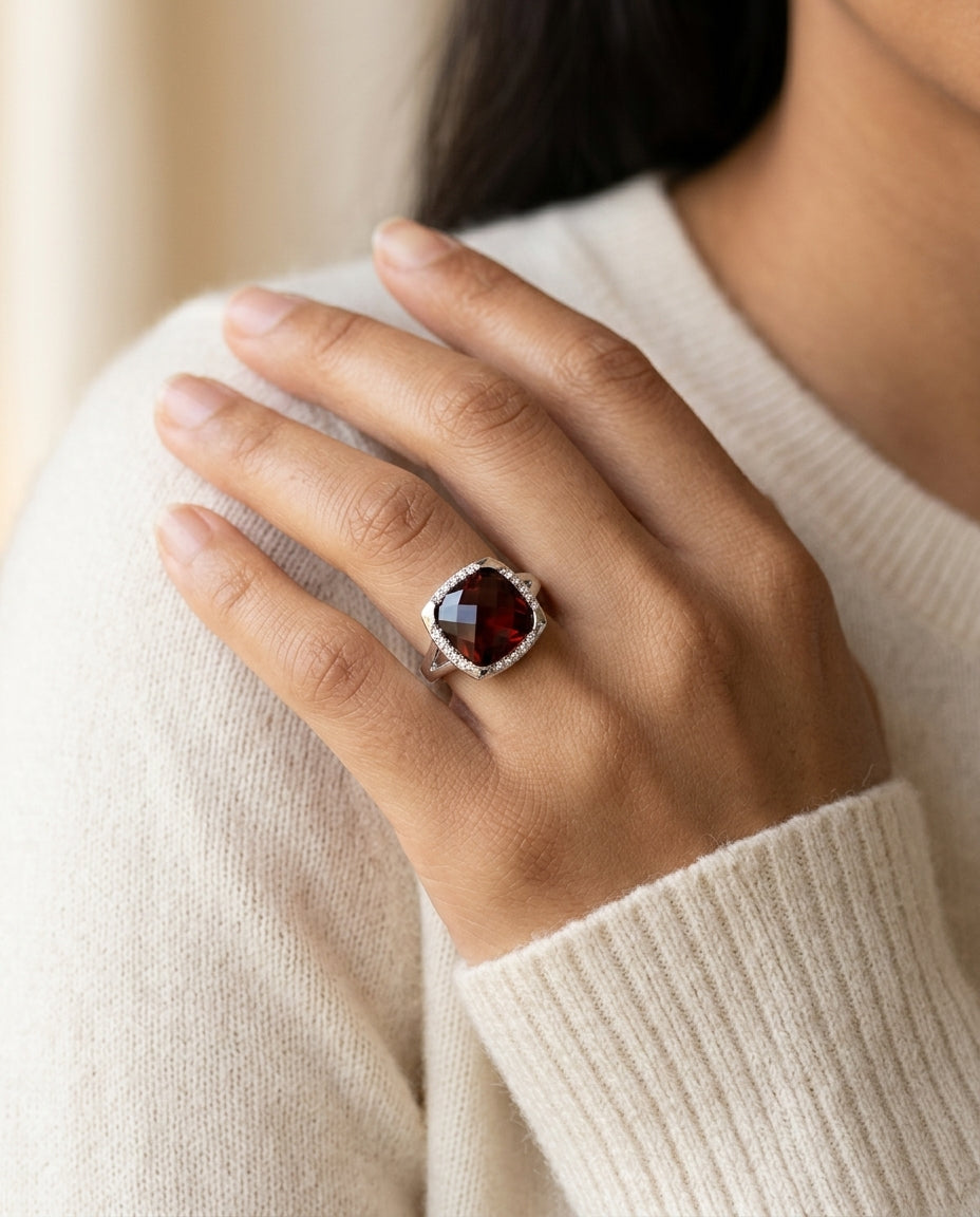 Garnet And Diamond Cushion Bezel Split Shank Ring In 14k White Gold — editorial close-up