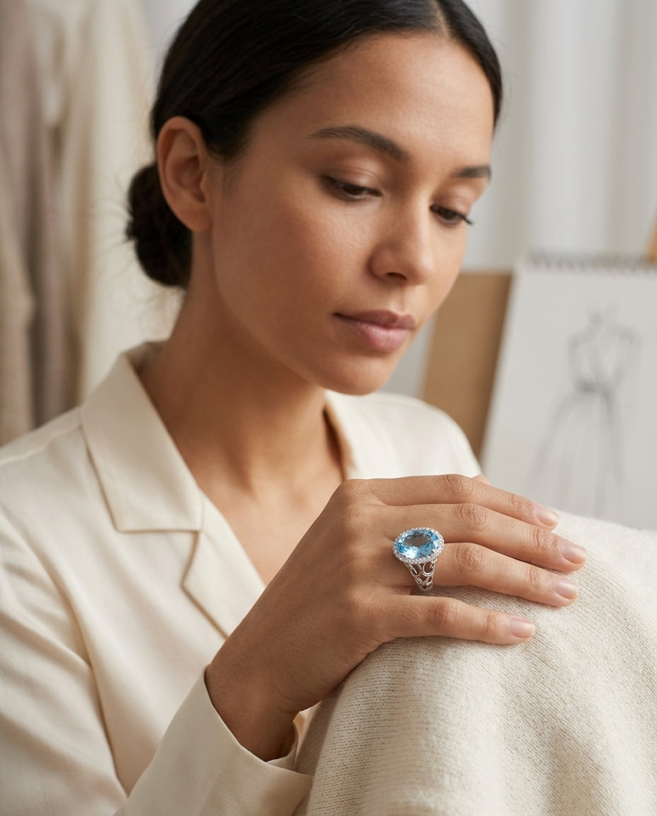 Swiss Blue Topaz Oval And Diamond Ring In 14k White Gold — editorial close-up