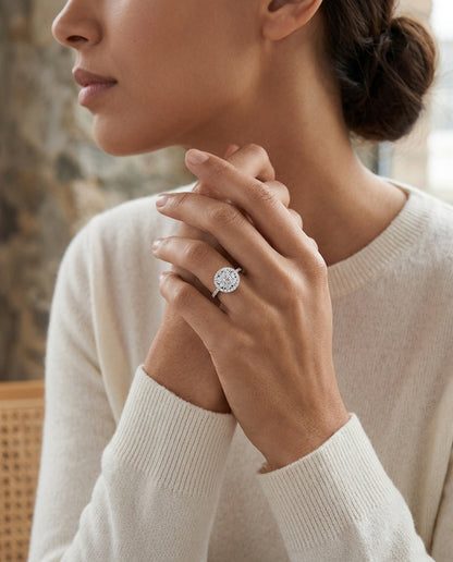 Diamond Halo Ring With Tapered Shank In 14k White Gold — editorial close-up