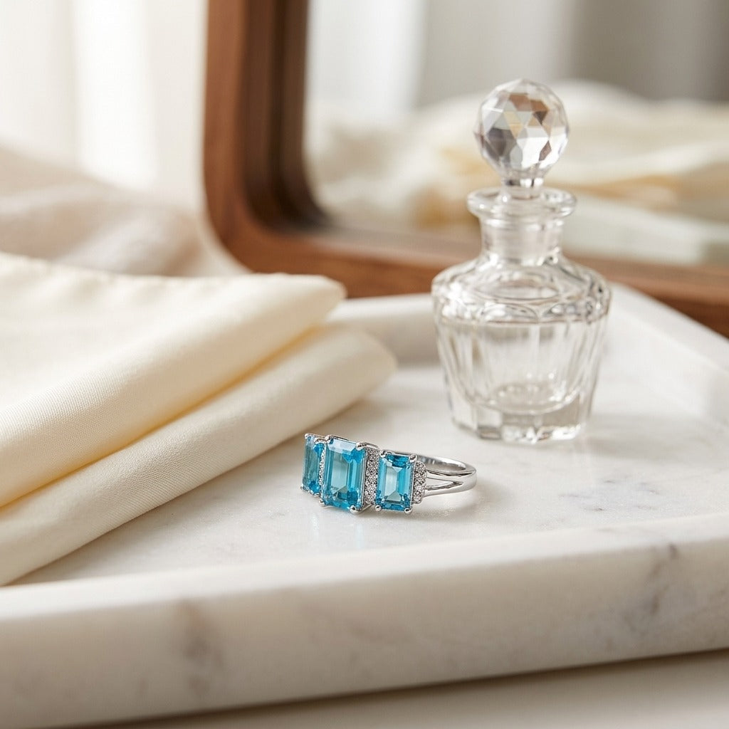 Blue Topaz and Diamond 3 Stone Emerald Cut Ring in 14k White Gold 0.12ctw Hi/Si — marble silk