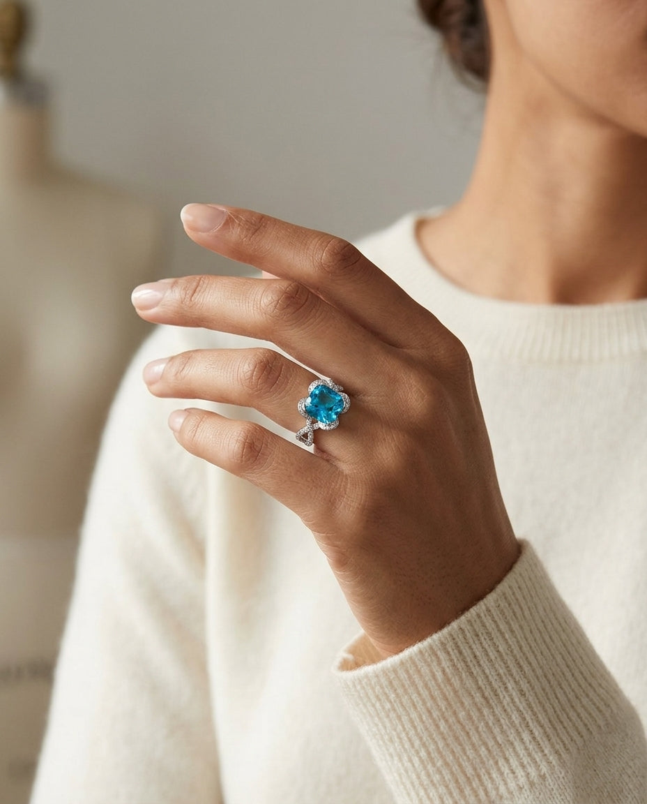 Swiss Blue Topaz Cushion And Diamond Twist Shank Ring In 14k White Gold — editorial close-up