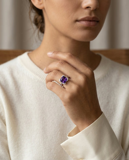 Brilliant Cushion Cut Amethyst & Diamond Ring With Unique Ribbon Design In 14k White Gold — editorial close-up