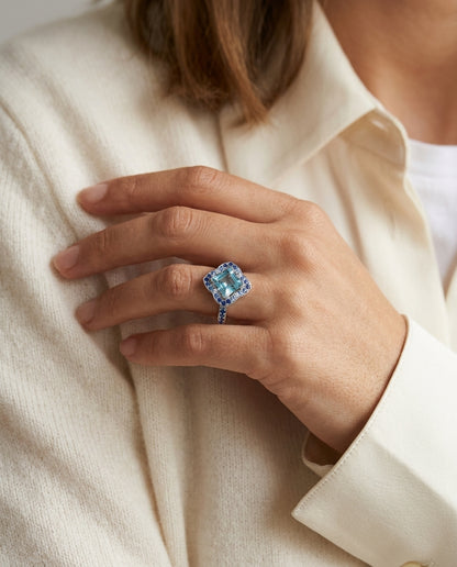Blue Topaz Center With Sapphire And Diamond Sides In 14k White Gold — editorial close-up