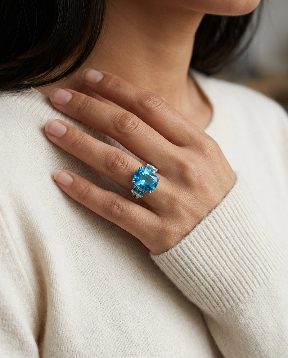 Blue Topaz 10x8 Cushion And Diamond Split Shank Ring 14k White Gold — editorial close-up