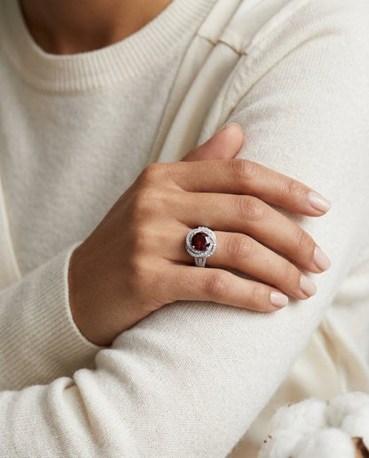 Garnet And Diamond Halo Ring In 14k White Gold — editorial close-up