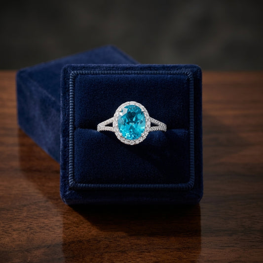 Blue Topaz And Diamond Oval Halo Split Shank Ring In 14k White Gold ( Hi / Si ) — gift presentation