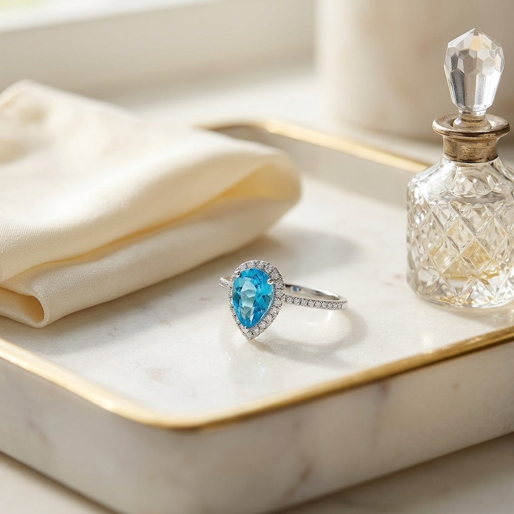 Blue Topaz and Diamond Pear Shape Halo Ring in 14k White Gold (9x6mm) — marble silk