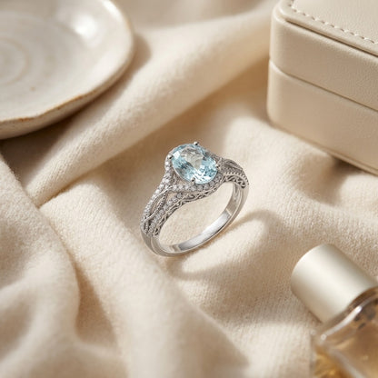 Aquamarine Oval and Diamond Ring 14k White Gold — textile flat lay