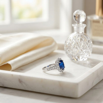 Sapphire and Diamond Oval Ring with Prong-Set Frame and Graduated Shank in 14k White Gold (8x6mm) — marble silk
