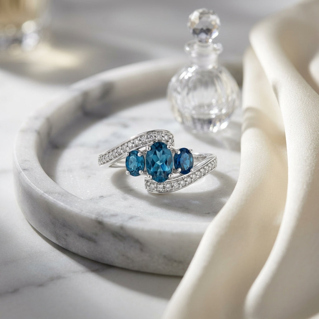 London Blue Topaz Three Stone Swirl Ring in 14k White Gold 1/8ctw — atelier still life