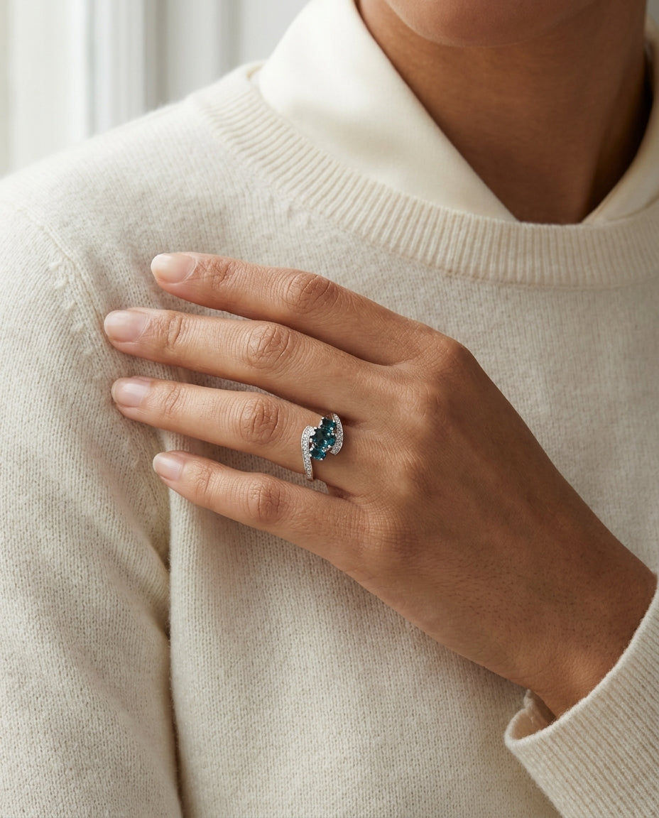 London Blue Topaz Three Stone Swirl Ring in 14k White Gold 1/8ctw — editorial close-up