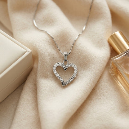 Diamond Dangle Heart Pendant In 14k White Gold — textile flat lay