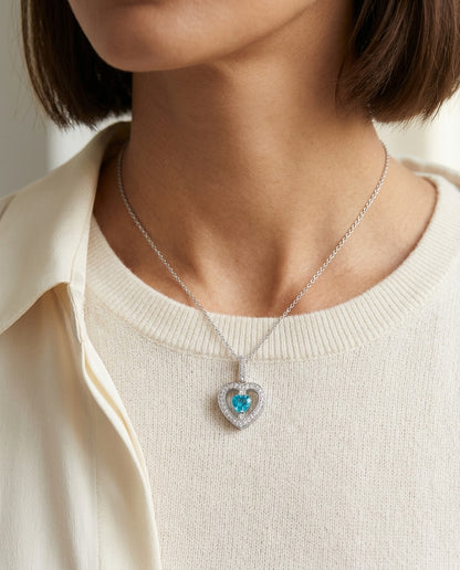 Blue Topaz Heart And Diamond Pendant 14k White Gold — editorial close-up