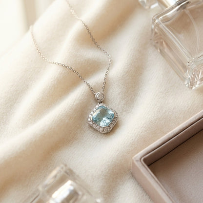 Blue Topaz and Diamond Cushion Kite Pendant in 14k White Gold 17 Inch Baby Curb Chain — textile flat lay